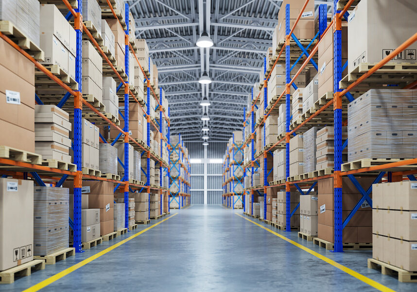 Warehouse or storage and shelves with cardboard boxes. Industrial background.